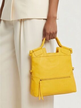Yellow Foley and Corinna purse